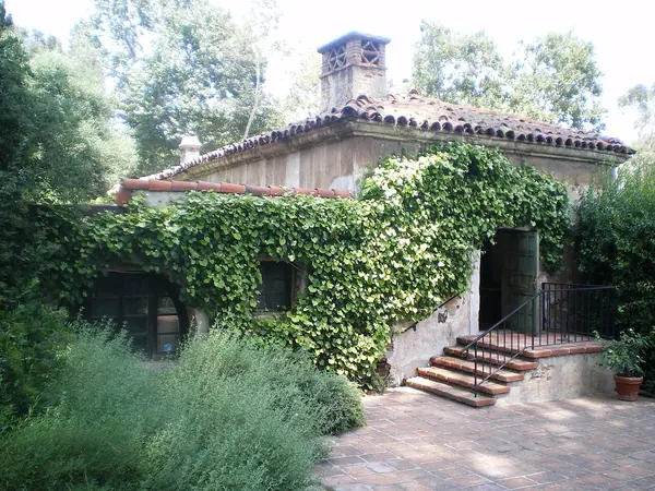 El Molino Viejo, the 1816 mission grist mill in San Marino, California, covered in ivy